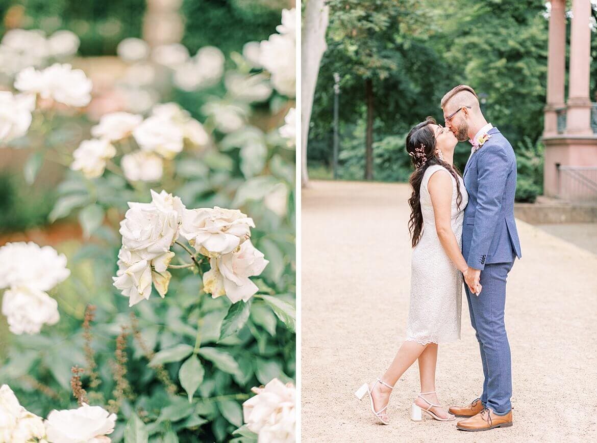 Brautpaar küsst sich und Rosen